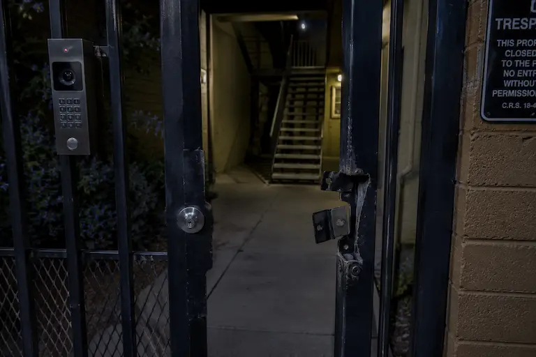 Broken lock on an apartment security gate | Colorado negligent security attorney | Lionheart Injury Law