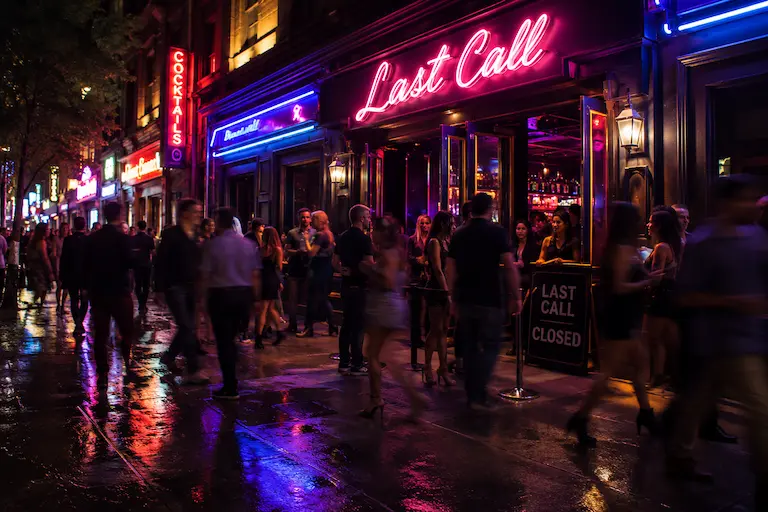 Neon-lit bar exterior at night | Denver bar and nightclub assault lawyer | Lionheart Injury Law
