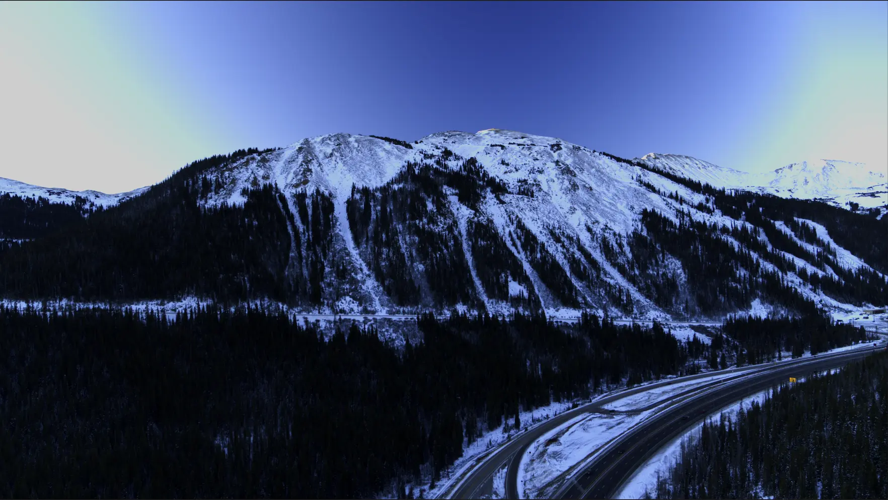 Aerial view of a Colorado mountain highway | Colorado head-on collision attorney | Lionheart Injury Law